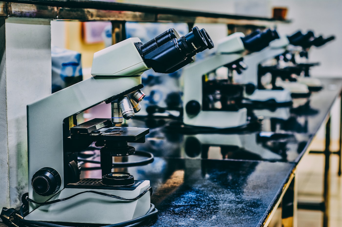 Row of microscopes in an imaging room